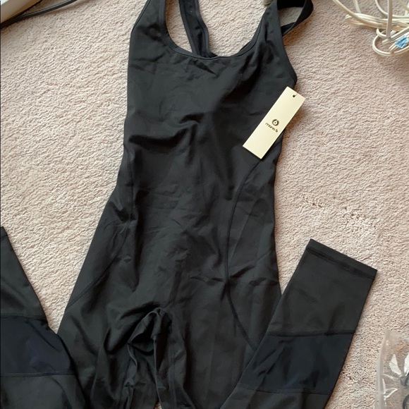 NWT. mono b black cross back jumpsuit.